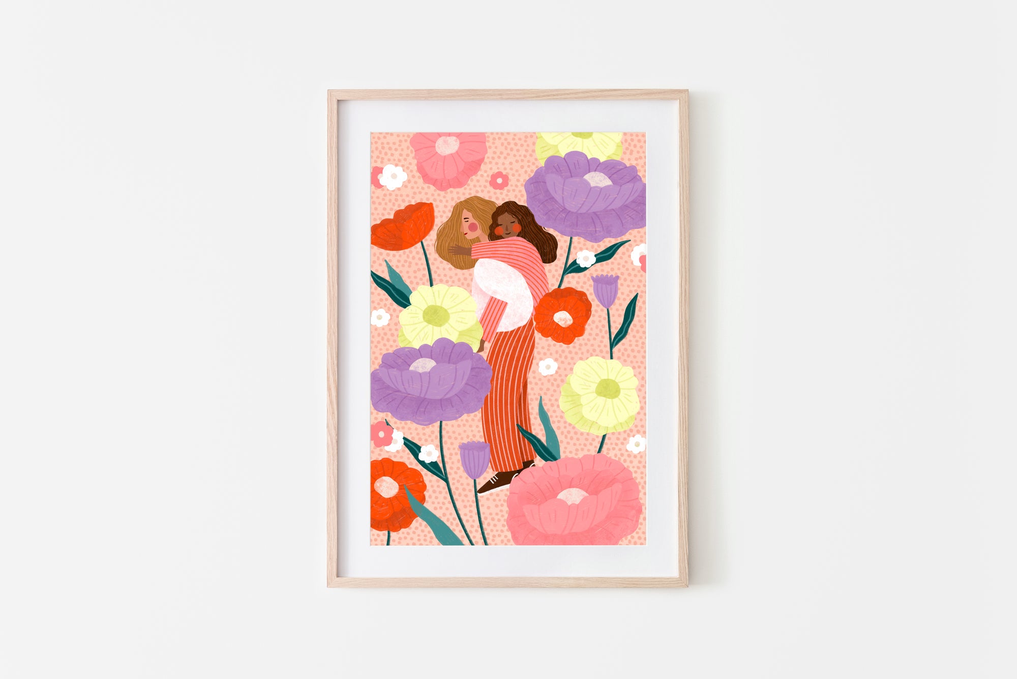 MUM AND DAUGHTER IN FLORAL GARDEN